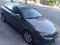 Мокрый асфальт Chevrolet Gentra, 3 позиция 2016 года, КПП Автомат, в Ташкент за 7 890 y.e. id7259927