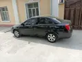 Черный Chevrolet Gentra, 1 позиция Газ-бензин 2023 года, КПП Механика, в Фергана за 11 000 y.e. id7136487