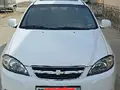Белый Chevrolet Lacetti, 3 позиция 2023 года, КПП Автомат, в Навои за 12 800 y.e. id7113840
