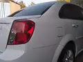 Белый Chevrolet Lacetti, 3 позиция 2009 года, КПП Автомат, в Самарканд за 6 700 y.e. id7067202