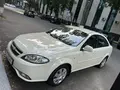 Молочный цвет Chevrolet Lacetti, 3 позиция 2014 года, КПП Автомат, в Андижан за 7 900 y.e. id7208453