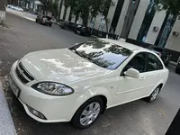 Молочный цвет Chevrolet Lacetti, 3 позиция 2014 года, КПП Автомат, в Андижан за 7 900 y.e. id7208453