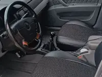 Белый Chevrolet Lacetti, 1 позиция Газ-бензин 2009 года, КПП Механика, в Зарбдарский район за 4 250 y.e. id7143394