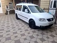 Белый Volkswagen Caddy 2010 года, КПП Механика, в Кургантепа за 10 200 y.e. id7234588