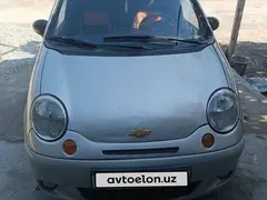Мокрый асфальт Chevrolet Matiz, 2 позиция 2005 года, КПП Механика, в Фергана за 