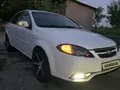 Белый Chevrolet Lacetti, 2 позиция 2010 года, КПП Механика, в Кумкурганский район за ~4 164 y.e. id7357091