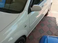 Белый Chevrolet Lacetti, 1 позиция Газ-бензин 2009 года, КПП Механика, в Янгибазарский район за 5 000 y.e. id7426670