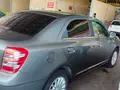 Мокрый асфальт Chevrolet Cobalt, 4 позиция 2014 года, КПП Автомат, в Шерабадский район за 7 800 y.e. id7321763