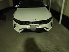 Белый Kia K5 2023 года, КПП Автомат, в Бекабад за 28 300 y.e.