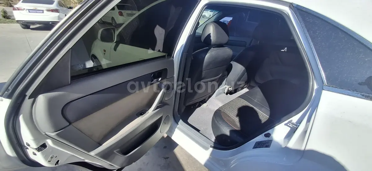 Chevrolet Gentra,  1 позиция Газ-бензин