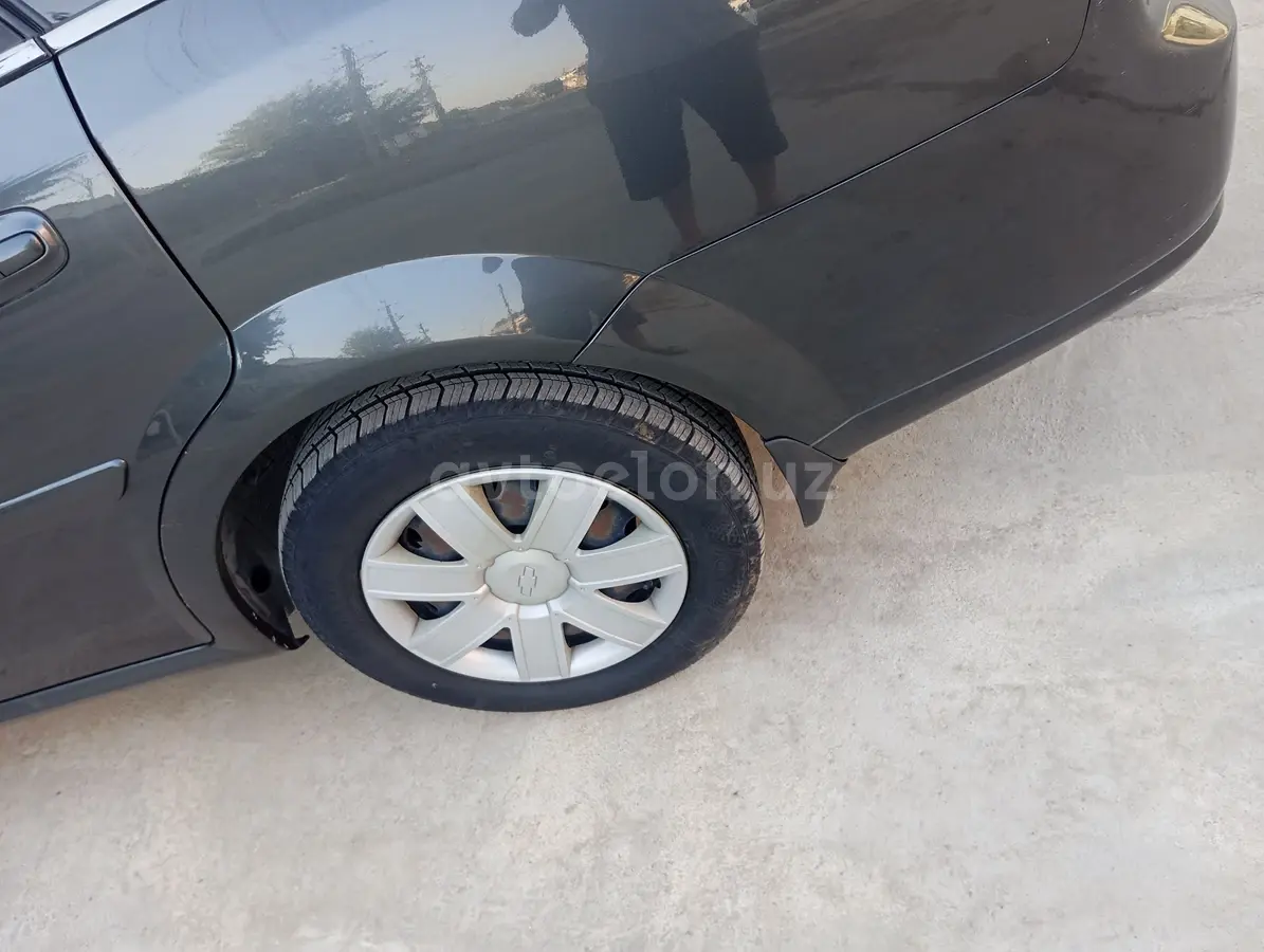 Chevrolet Gentra,  1 позиция Газ-бензин